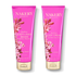 Two pink tubes of Nakerly Beauty body and hair care products, SkinFirm Body + Hair Wash and SkinFirm Body Cream, with gold caps and floral graphics, on a white background.