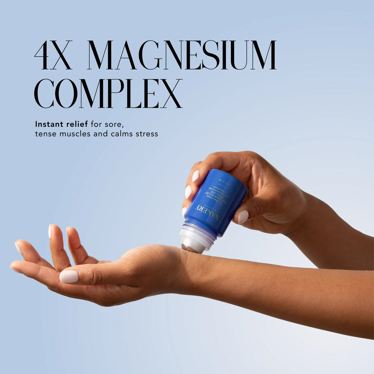 Nakery Beauty Tension Relief Roll-On being applied to the wrist, featuring a 4X magnesium complex for sore, tense muscles and stress relief.