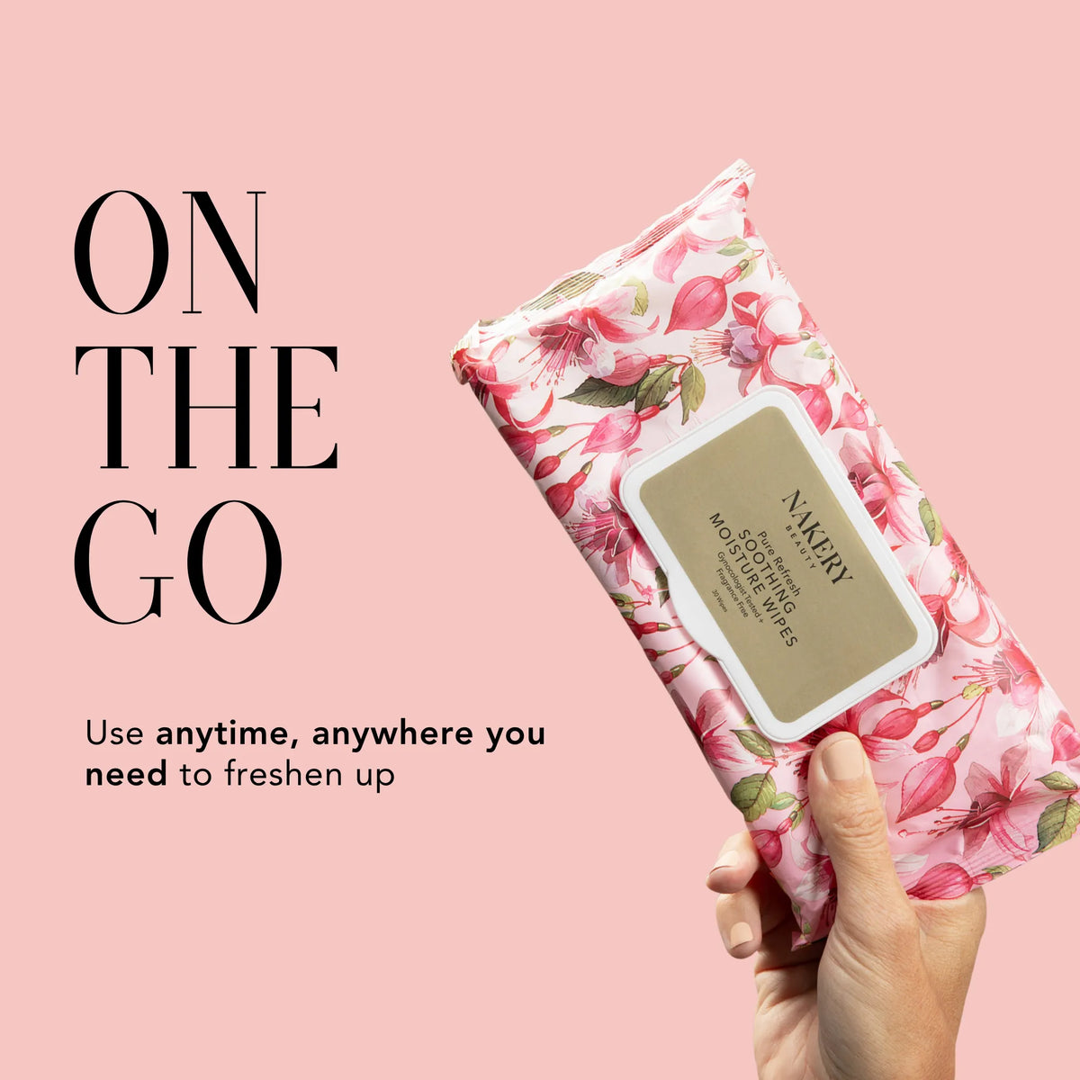 Holding Nakery Beauty Pure Refresh Soothing Moisture Wipes, designed for convenient anytime, anywhere intimate refreshing.